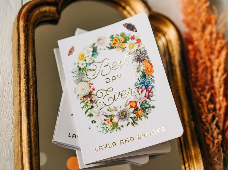 floral vow books with gold foil lettering from Etsy