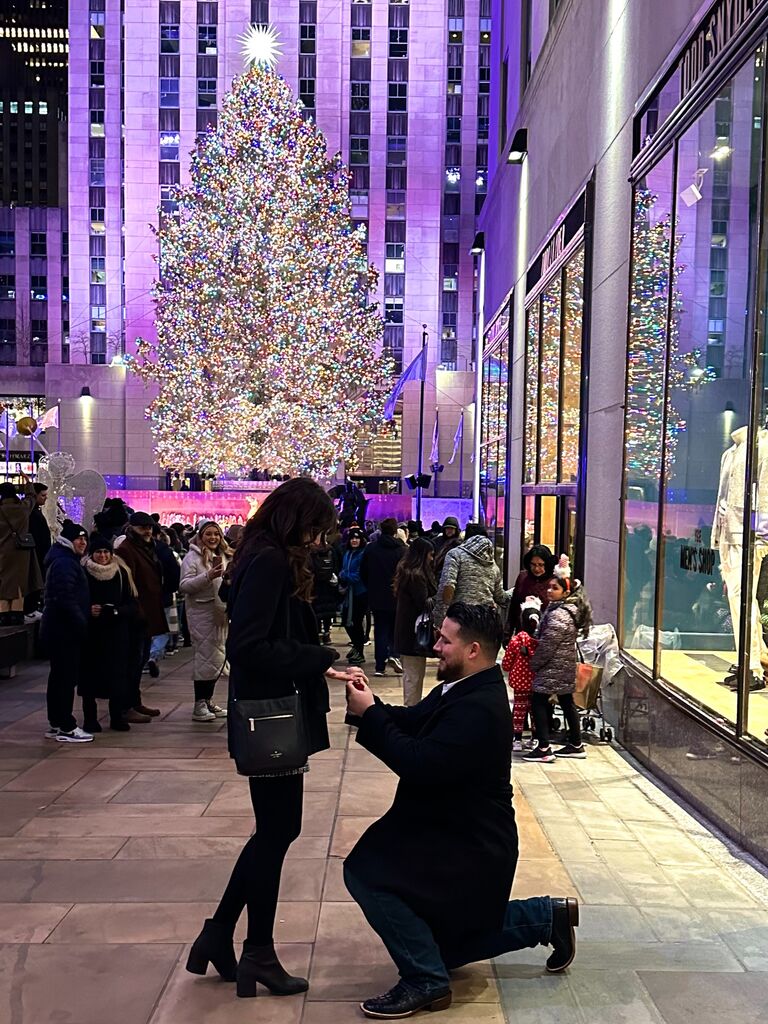 ...and New York! They got engaged in front of the Rockefeller Christmas Tree in NYC in December 2022!