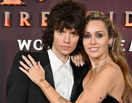 Miley Cyrus and Maxx Morando on the red carpet