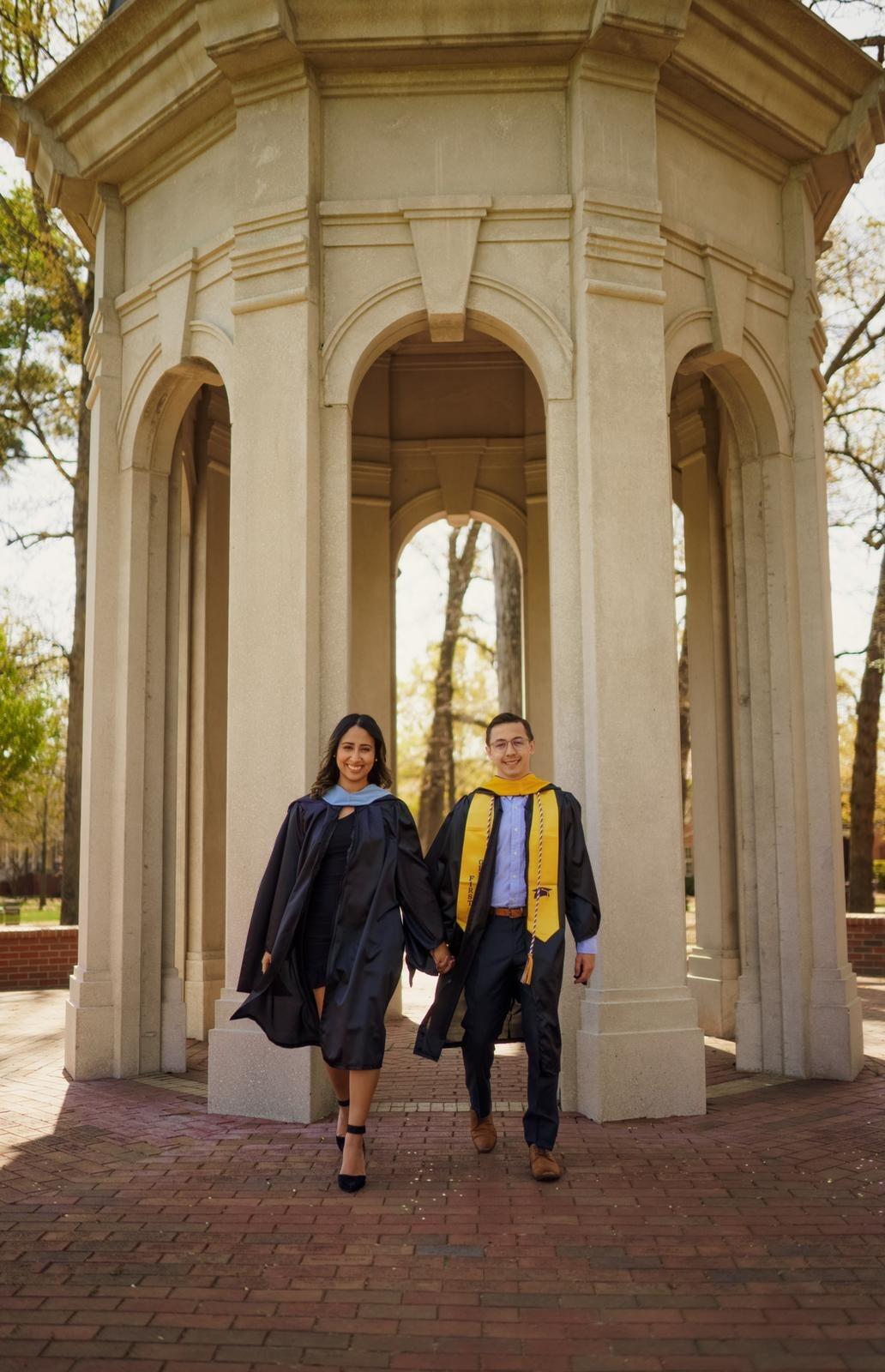 Graduating from ECU with our Masters!