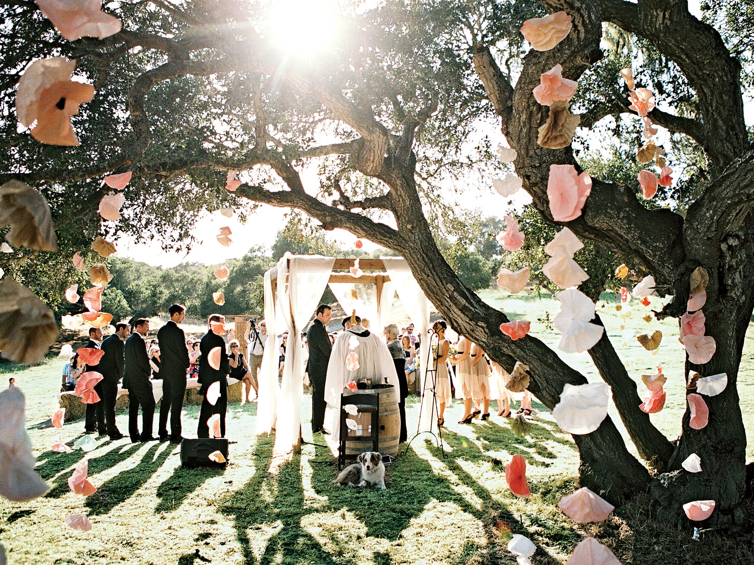 Paper flower outdoor ceremony decor