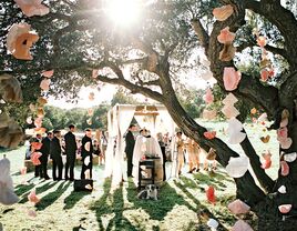 Paper flower outdoor ceremony decor