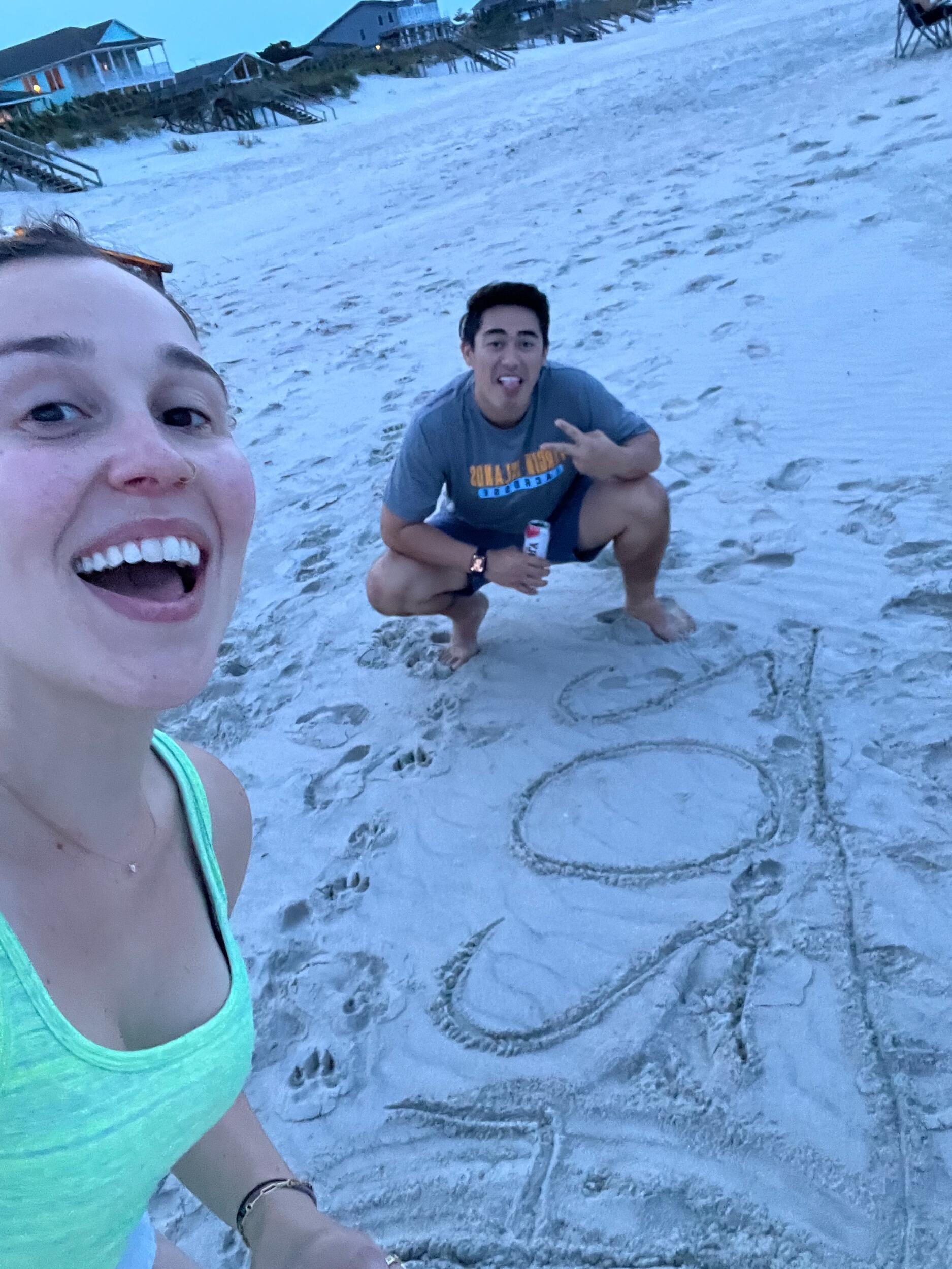 Jaxon's second beach trip with Emily's family.  They carved 2024 in the sand to commemorate the moment.