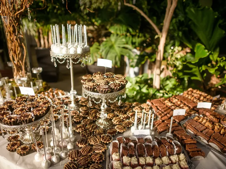 Assorted chocolate brownie engagement party dessert table idea