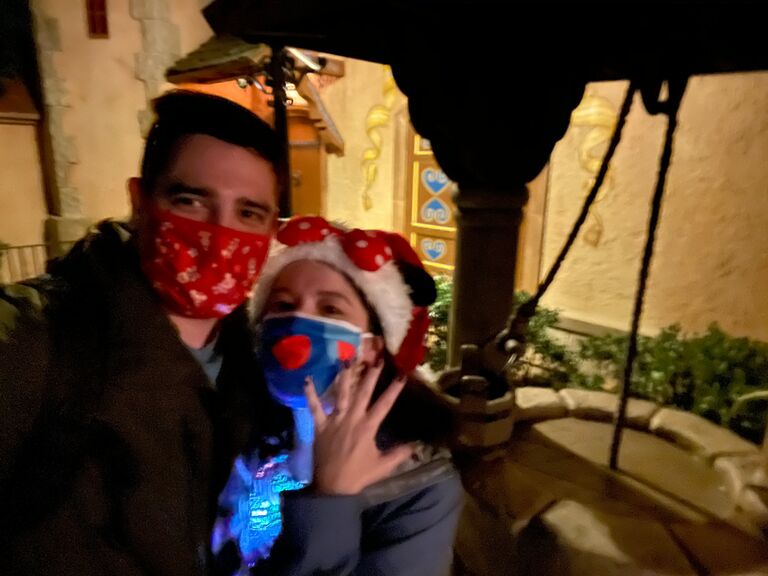 We got engaged at Disney! Adam picked the perfect spot at Victoria's favorite Snow White's well!