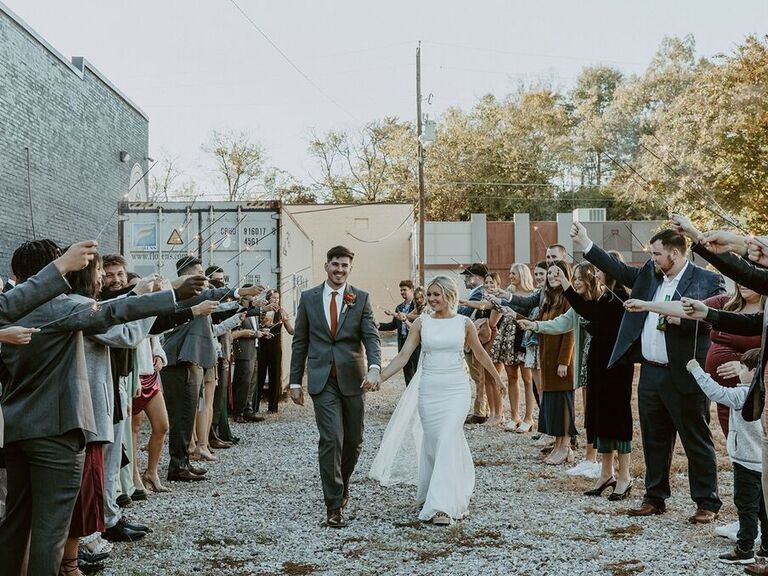 Bride and groom celebrate their wedding at Crystal Ridge Distillery in Hot Springs National Park, Arkansas. 