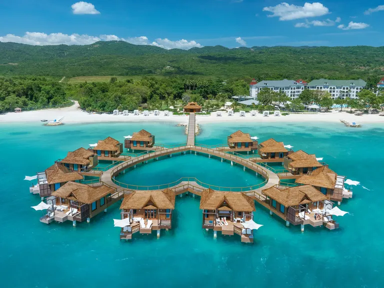 Bungalows on the water at Sandals South Coast all-inclusive resort in Jamaica