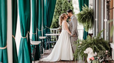 A wedding dress restorer displays more than 150 years of history