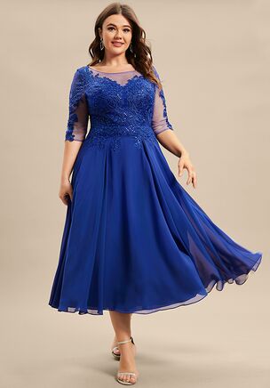 A beautiful dress made from flowing chiffon, featuring a delicate bodice adorned with sequins. The flattering scoop neckline is complemented by elegant 1/2 sleeves. The design flows into an A-line skirt that adds movement and grace, making it an ideal choice for formal events and special occasions.
