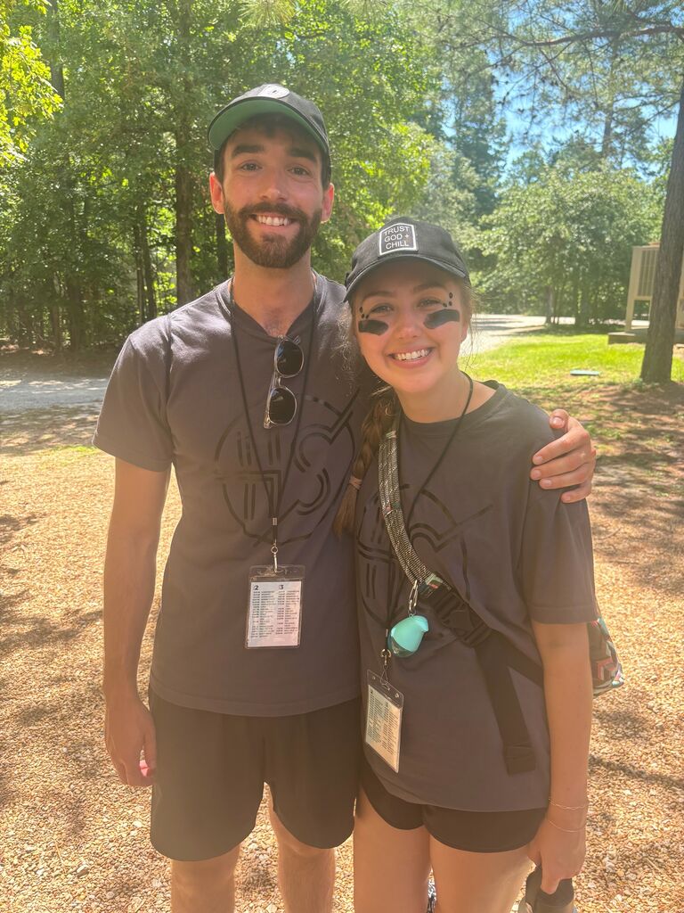 Leaders at high school church camp together. A lot of teenagers asking when we were getting married...