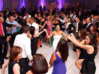 Wedding guests dancing on the floor