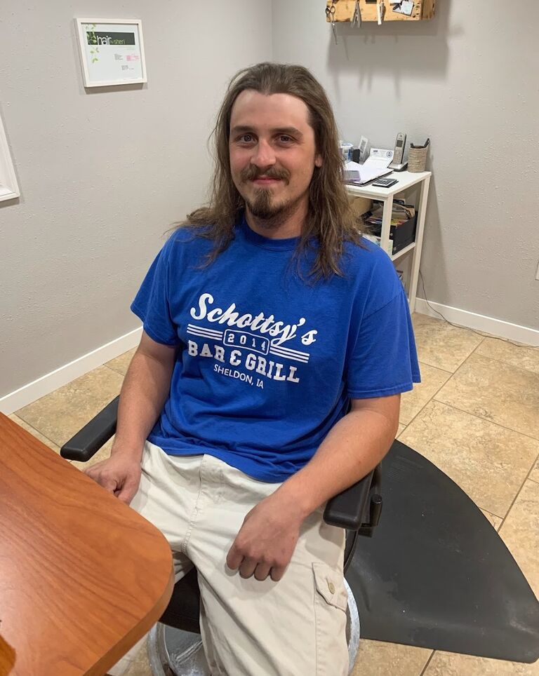 Nick donates his hair.