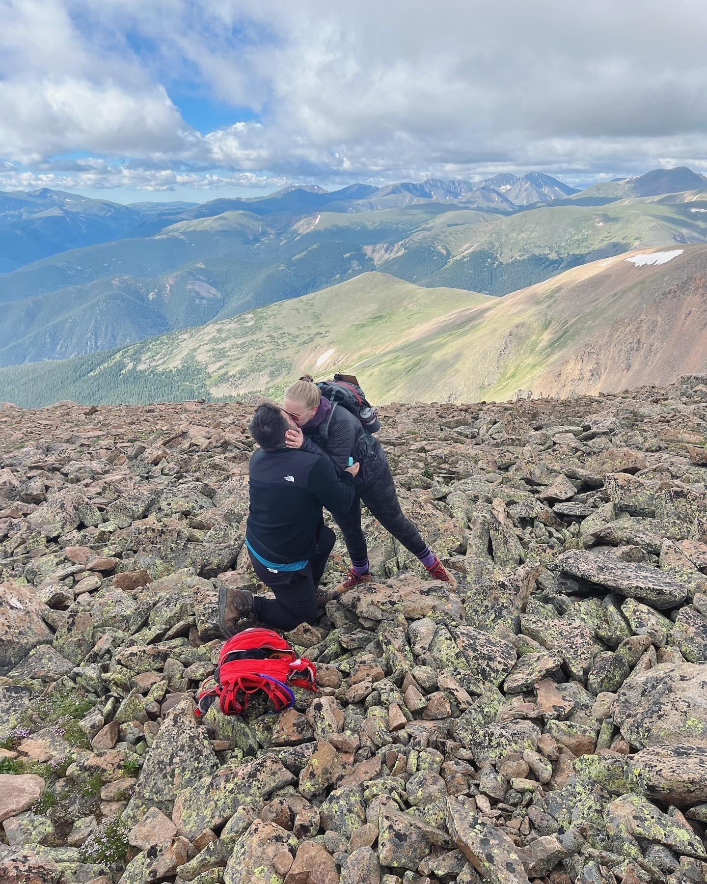 We got engaged at the summit of Mt. Flora at 13,142 feet. 