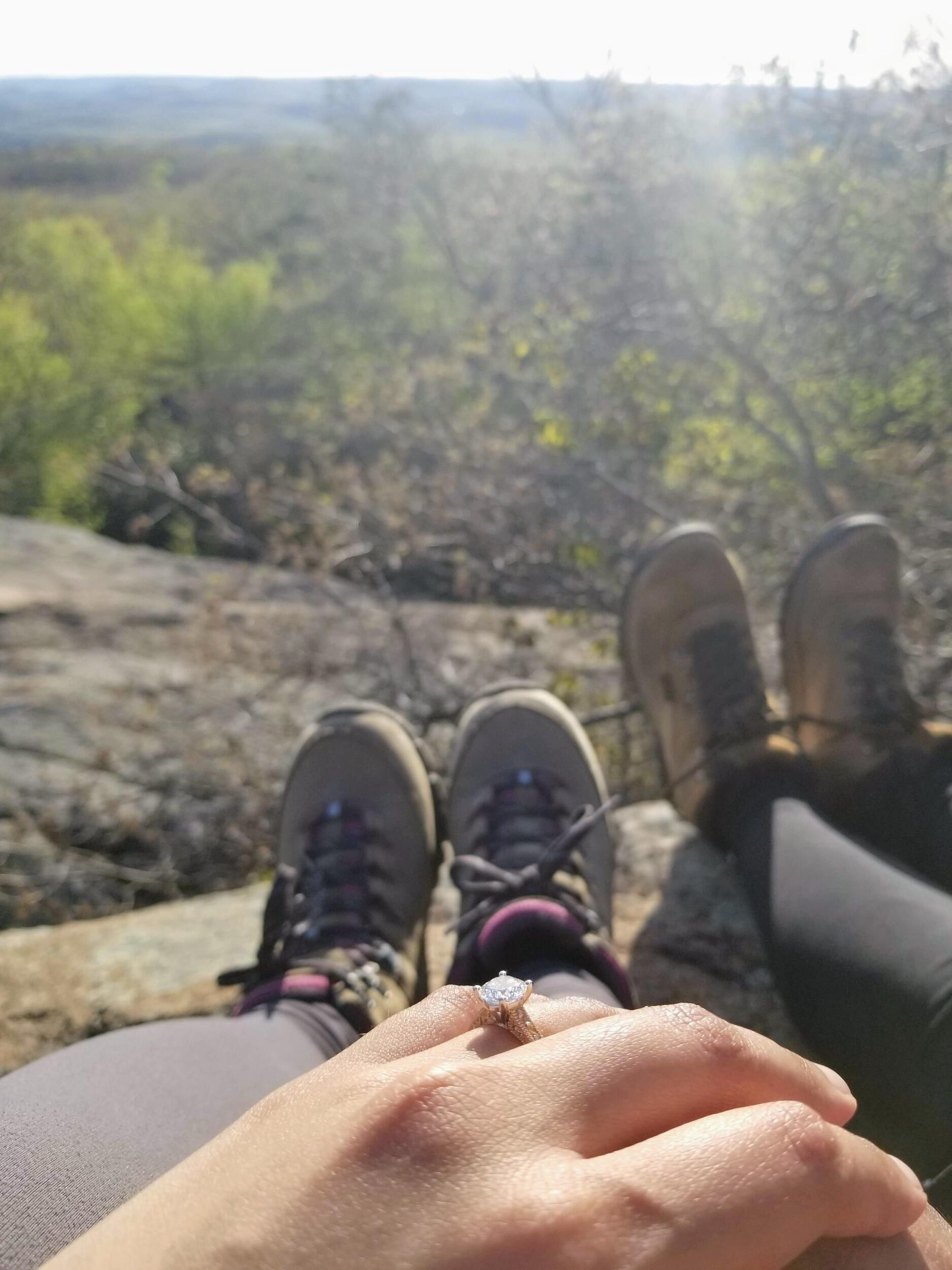 We got engaged on top of a mountain at sunset, just us.   
