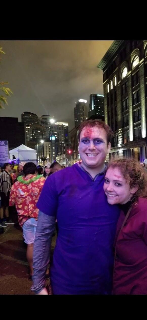 Nick and Elaina celebrating their first Halloween together at the Minnesota Zombie Pub Crawl!