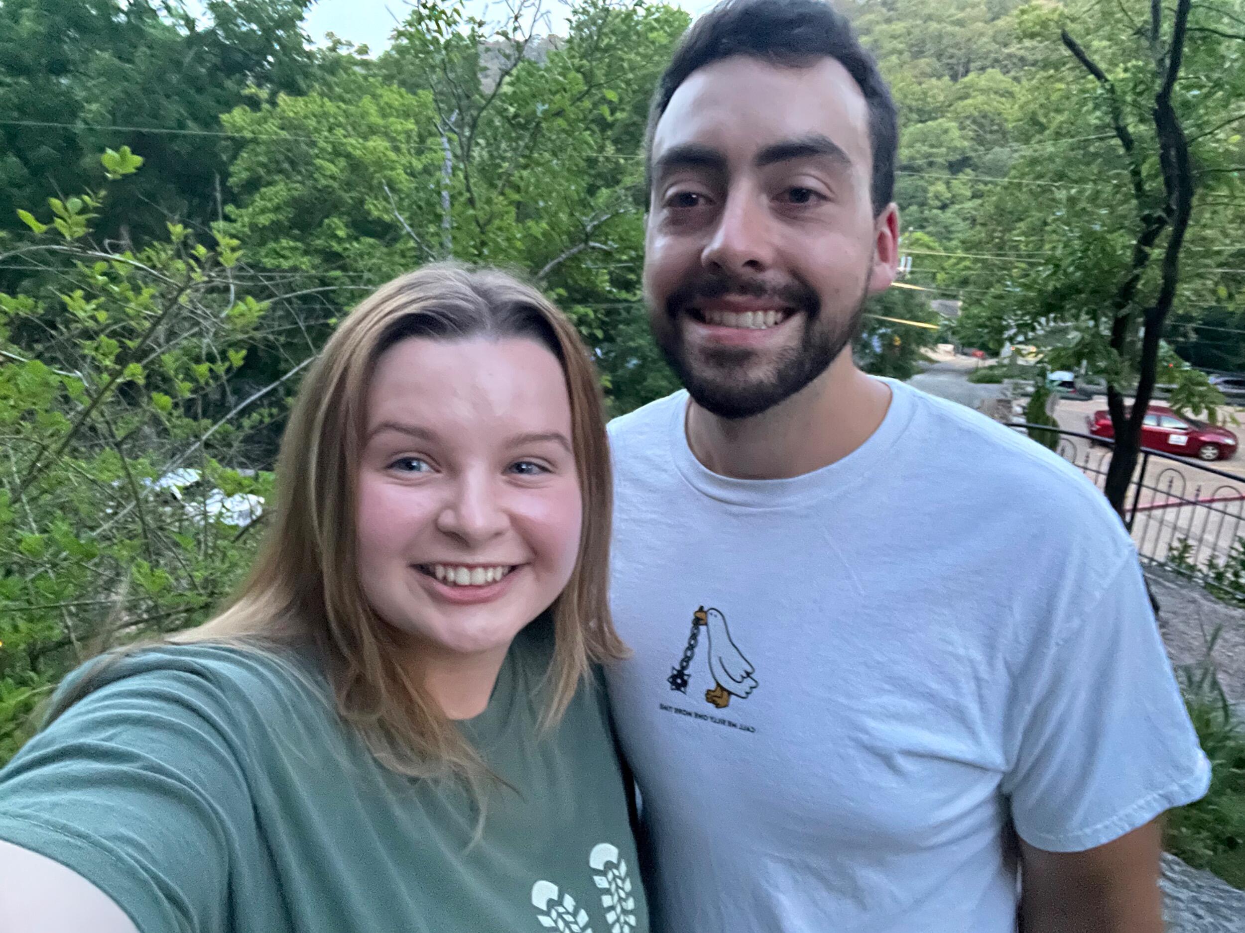 A selfie of Emma and Brendon just moments before B popped the question, and of course, Emma said yes! This selfie was taken next to a picturesque cliffside in Eureka Springs, Arkansas where Emma and Brendon planned a weekend getaway.