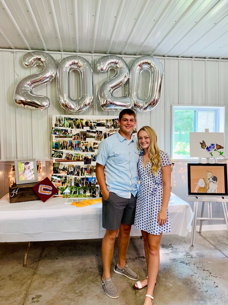 Jared always supporting Heather's milestones. High school grad party.