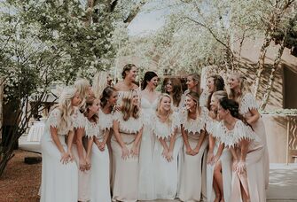 Bride and bridesmaids in white dresses