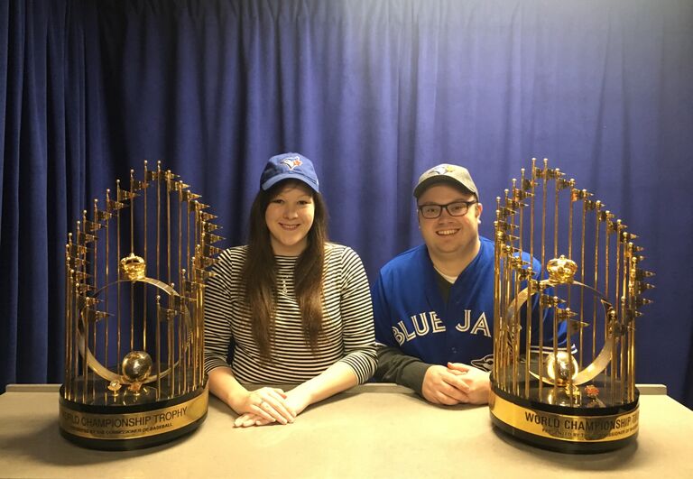 Posing with the Toronto Blue Jays’ World Series trophies