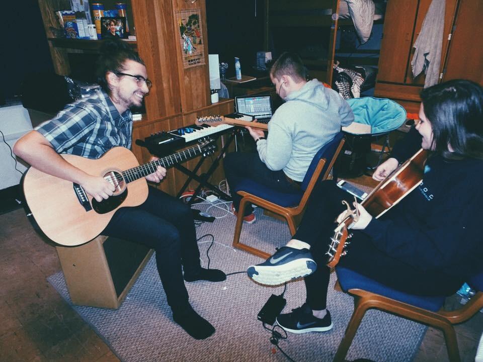 Their first picture together, taken in the boys dorm room at Missouri State University. After one semester in Chicago, Sammi decided to transfer to MSU where Matt & all of their shared friends were going to school. Matt & Sammi's friendship grew stronger over their shared love of music - as they're seen here, playing guitar with each other (they were playing Who You Love by John Mayer - the bride has an excellent memory).  