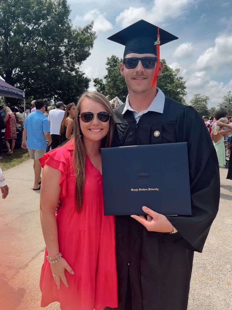 Jackson's college graduation! Also the same exact day he was offered his job at Cranston