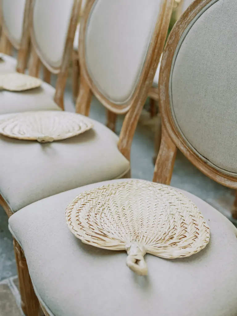 Wicker Fans on ceremony chairs