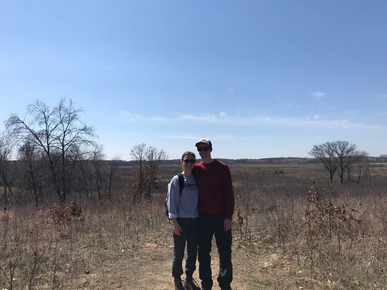 C & K officially started dating in March of 2020 and were soon basically inseparable (both due to the pandemic & their shared love of adventure). This was their first picture together as a couple, taken at the "most scenic view of Wisconsin". 