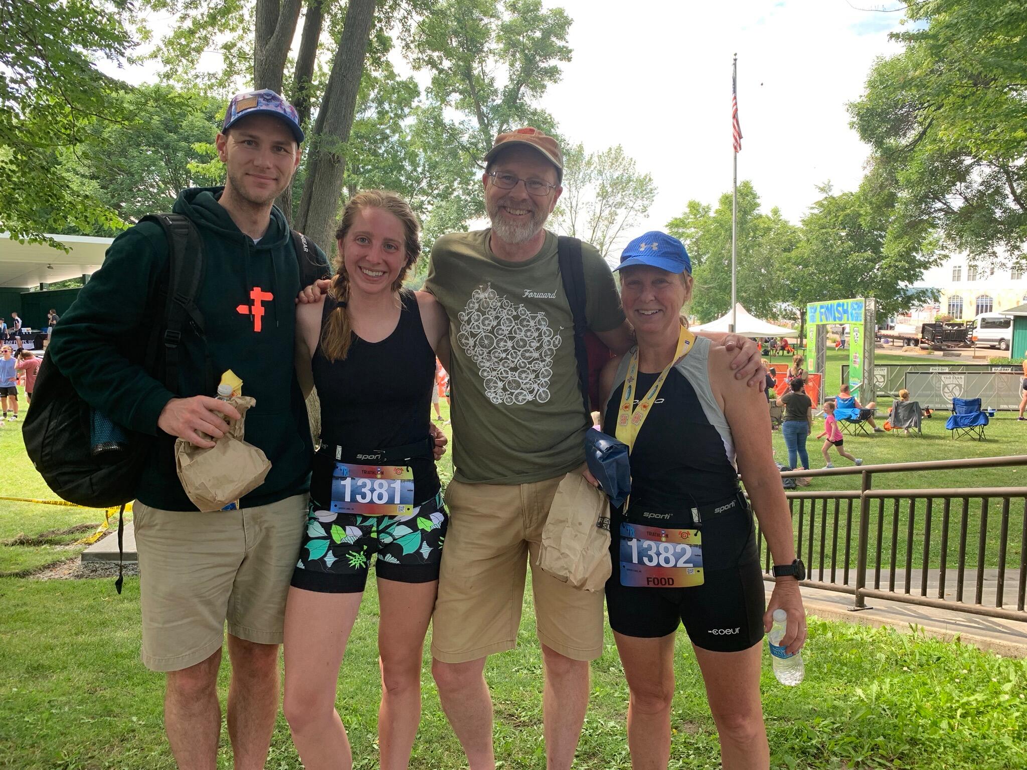 John cheers Nora and her mom on in the Green Lake Triathlon.