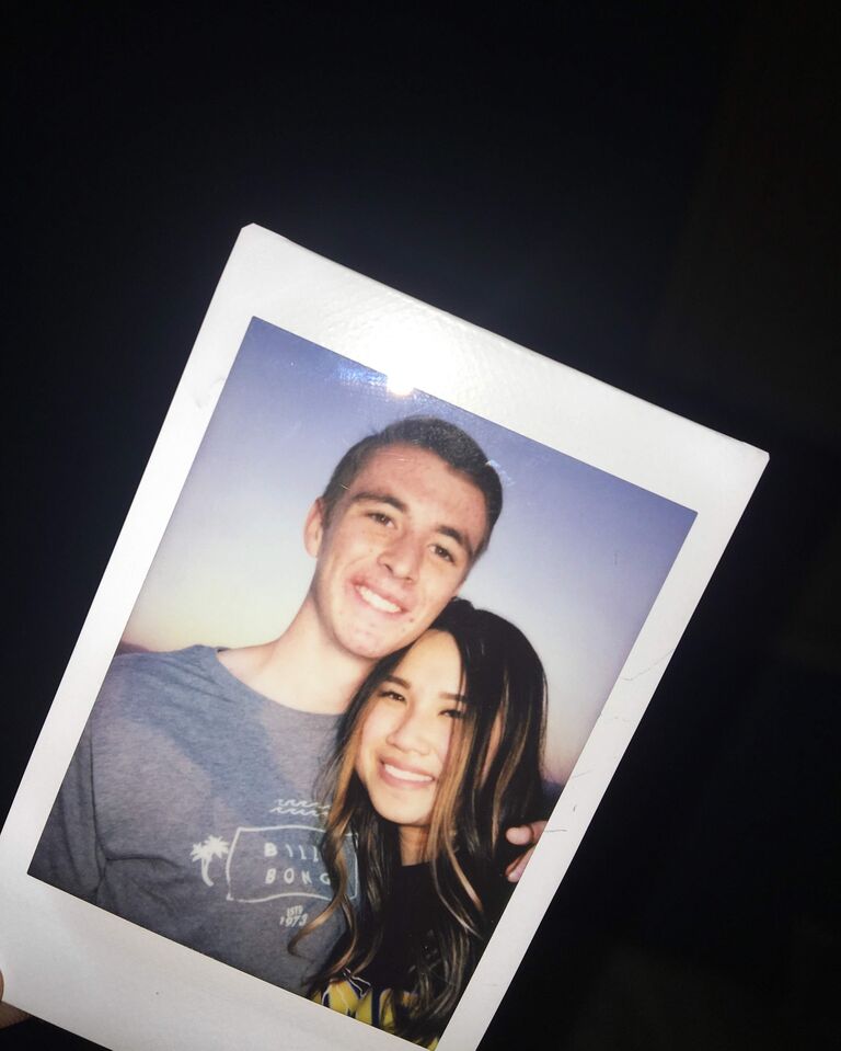 Justin and Vivian became official on this day. Pictured here is their date at Top of the World in Laguna Beach, CA. It started with a hike and ended with viewing the sunset on a rock and watching the stars when night fell. 