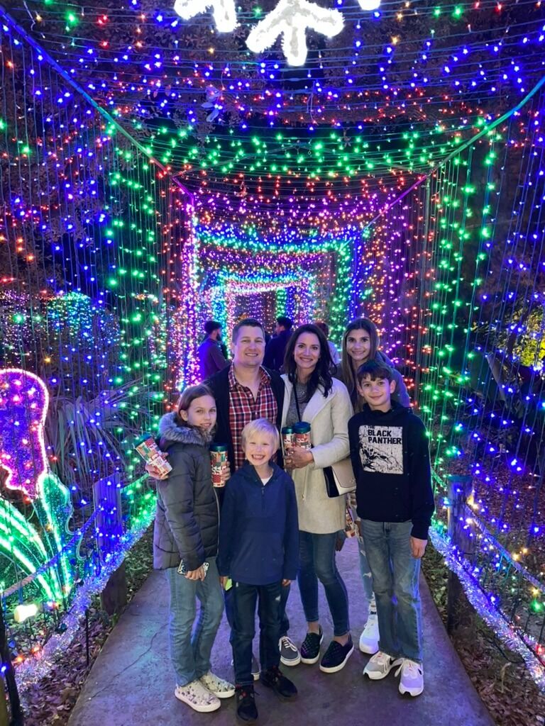 We introduced the kids to each other and us at a trip to Zoo Lights at the Houston Zoo.