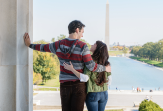 Couple standing in front of National Mall in Washington DC 