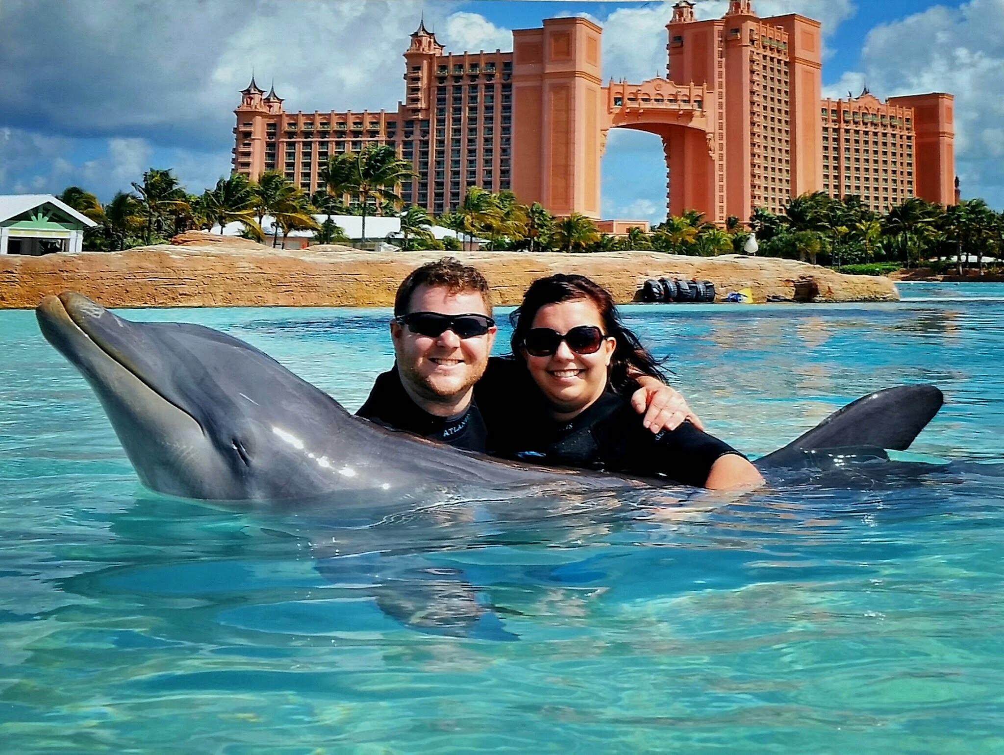 They swam with dolphins during a trip to Atlantis in the Bahamas. DJ grinned the whole time, the dolphin did tricks, and it was a solid 10/10.