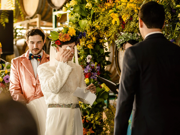 Groom crying during unique vow exchange. 