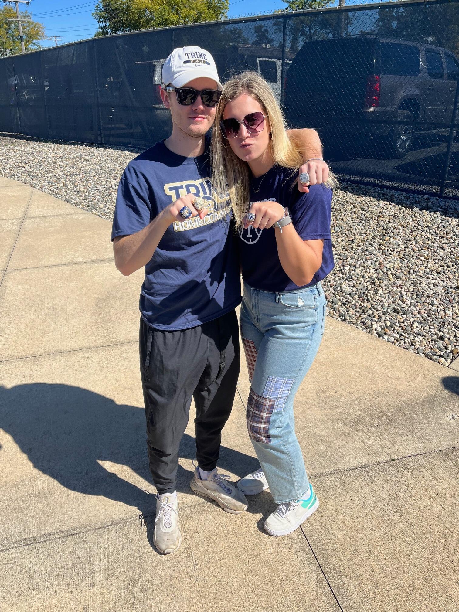 They spent the homecoming football game showing off their conference championship rings.