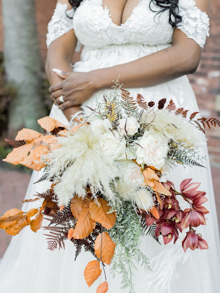 A burgundy and rust-toned wedding bouquet