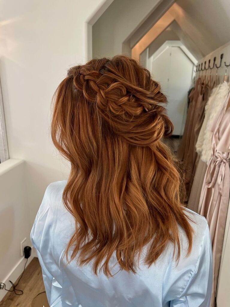Half-up wedding guest hairstyle with braid for medium-length hair