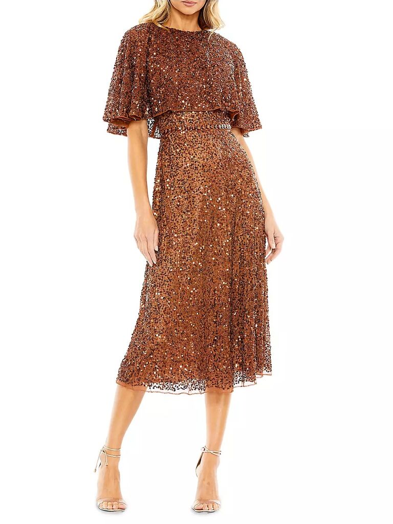 A shimmering copper midi dress with a bejewelled capelet from Saks Fifth Avenue