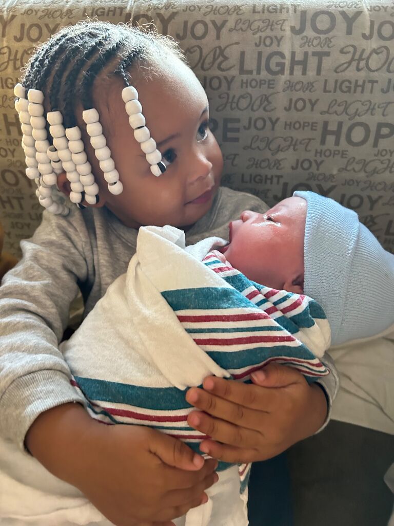 Our second greatest blessing. Baby boy Demik had made his arrival on this day. Our family is complete. Truly overfilled with joy. 
"Denver holding her baby brother for the first time ."