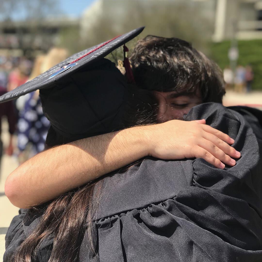 Savannah walked across the stage at her college graduation (although she had one last summer semester to go before she was officially done). Colin came to cheer Savannah on!