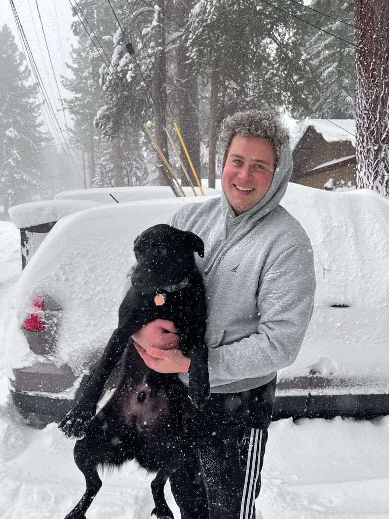 Daddy protecting Dale from the snow
