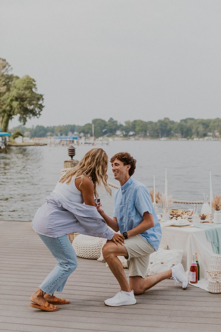 After their big gold medal win, Macie and Lucas grabbed coffee, and headed to a grad party. Macie was quite clueless, but Lucas had a huge plan. He brought Macie to her dock, and popped the big question, rendering Macie speechless for the second time in her life.
