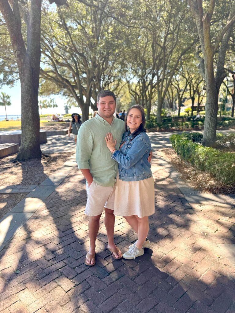 Celebrating our engagement during our hurricane evacuation in Charleston.