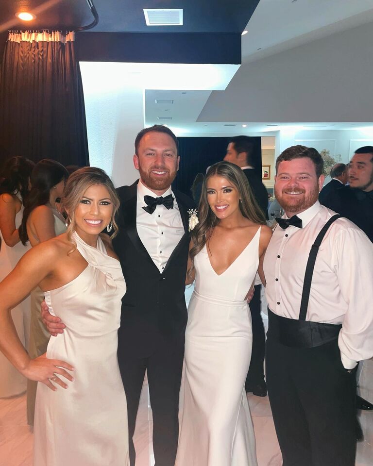 Ian and Savannah at their dear friends, Mike and Sarah's wedding! Their favorite thing to do is go to Taste of Texas together.