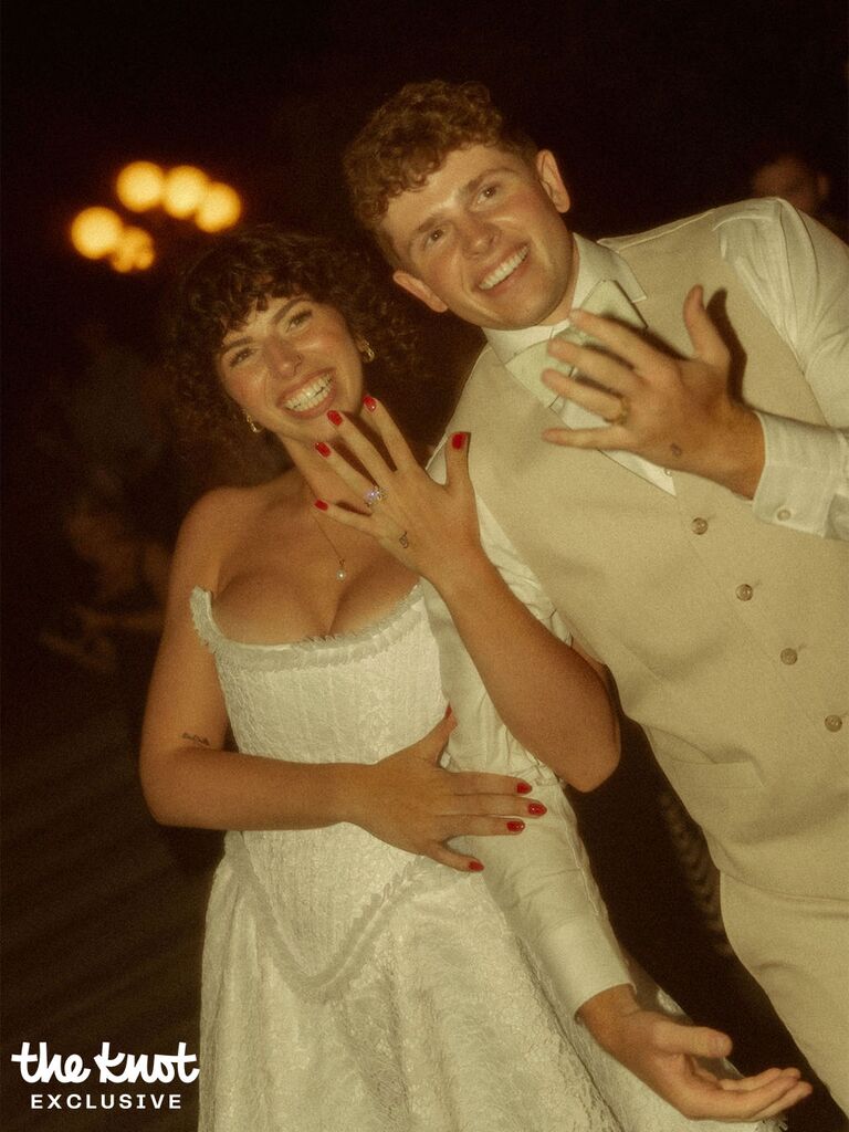 Tommy Winkler and wife Jess smiling on their wedding day