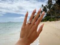 Engagement ring selfie on the beach