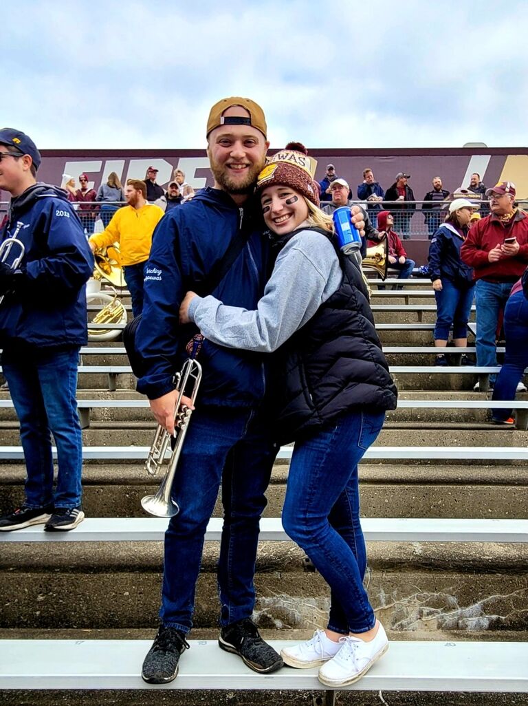 Kyle and Allison enjoying a yearly CMU homecoming game!