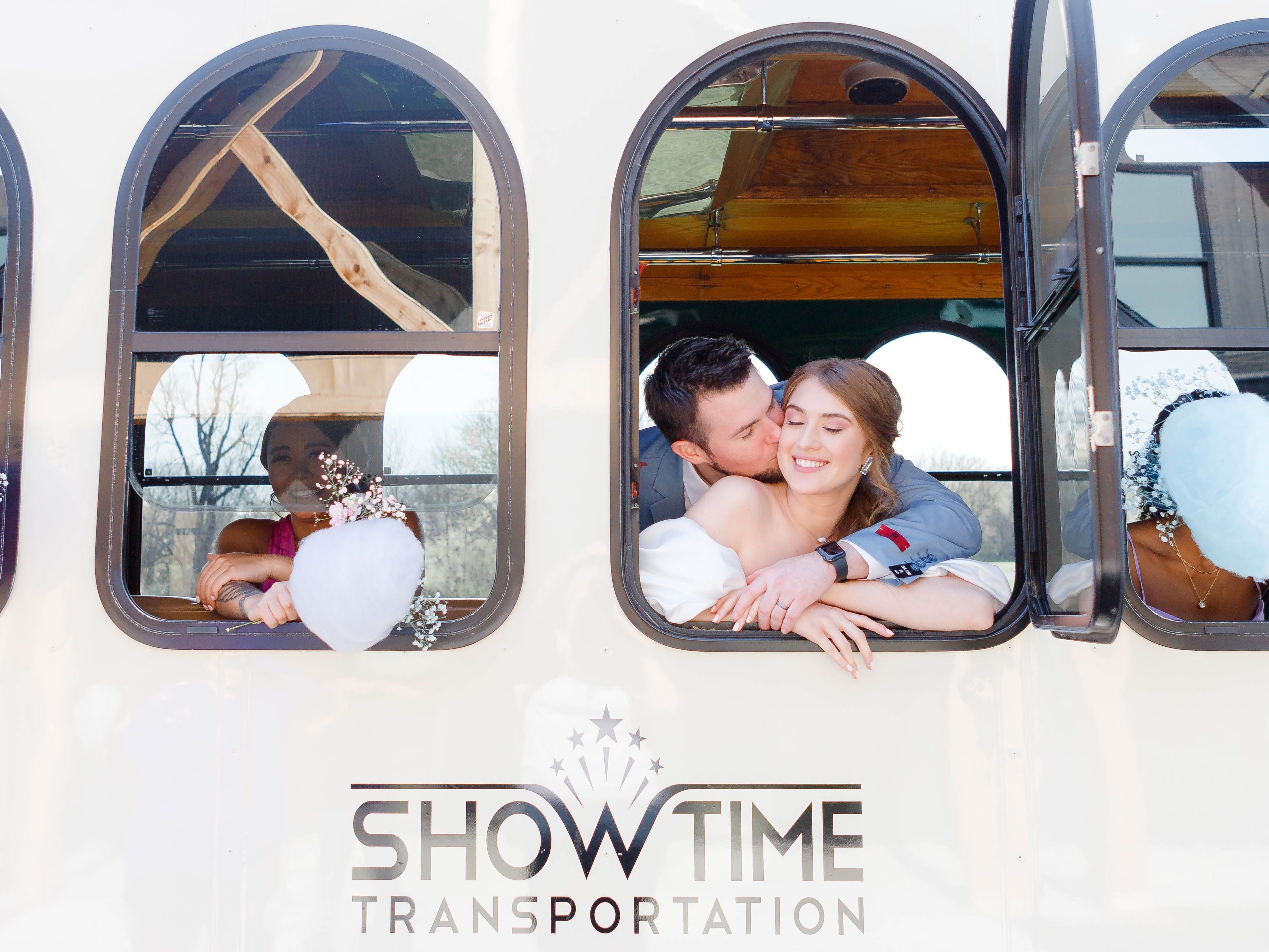 Couple looking outside of the trolley window