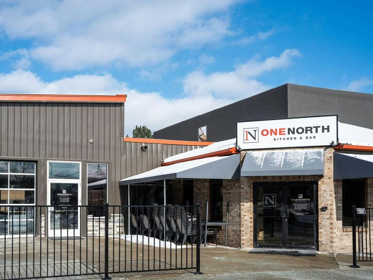 AJ and Taylor went on their first date to One North in Lansing. It was the first day COVID restrictions were lifted, and the garage doors had to be up. Taylor sat with her winter coat on the whole time.