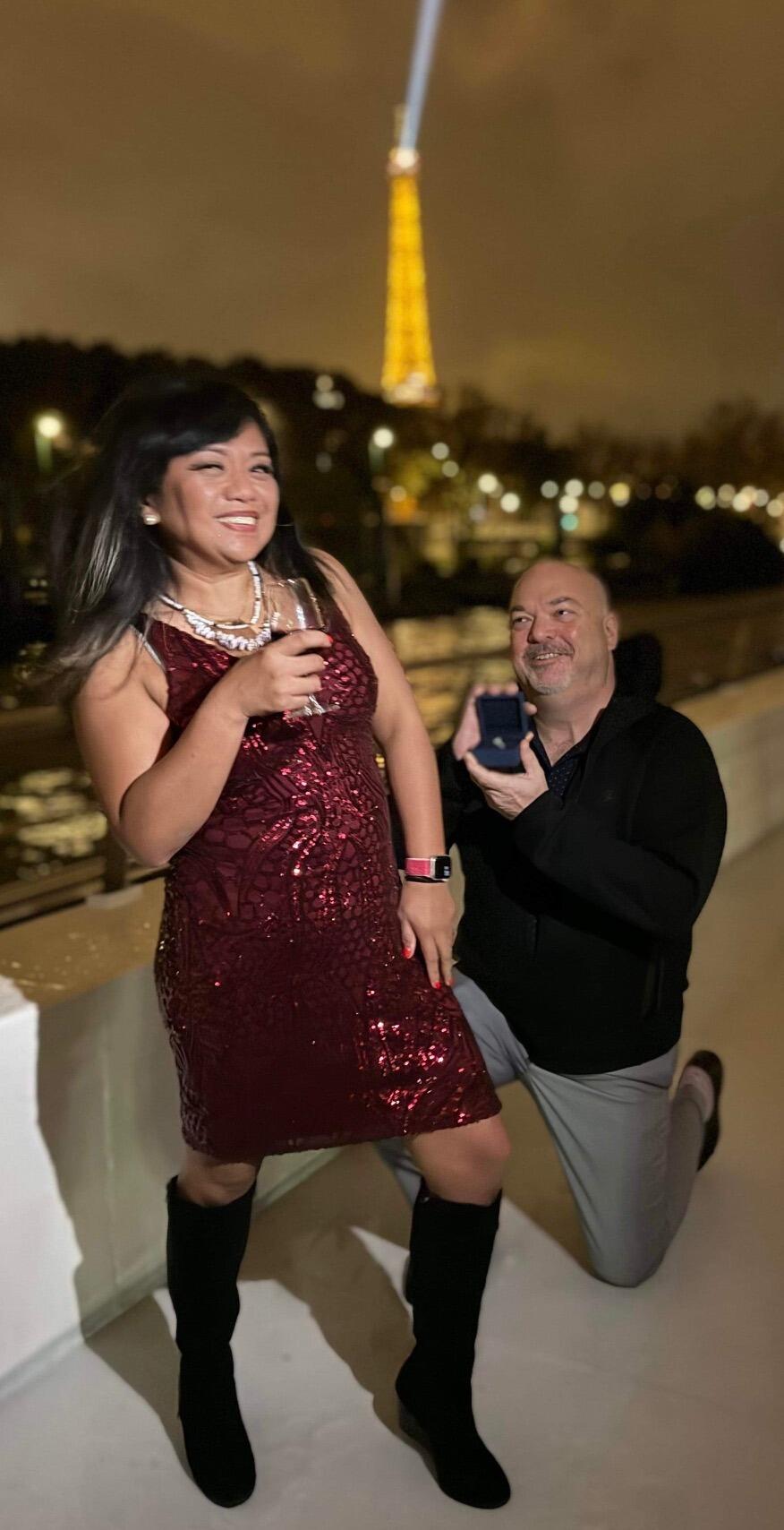 Irene had no idea that Jason is going to propose while on a dinner cruise along the Seine River in Paris, with the Eiffel Tower as the backdrop.