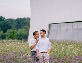 Couple in meadow after getting engaged